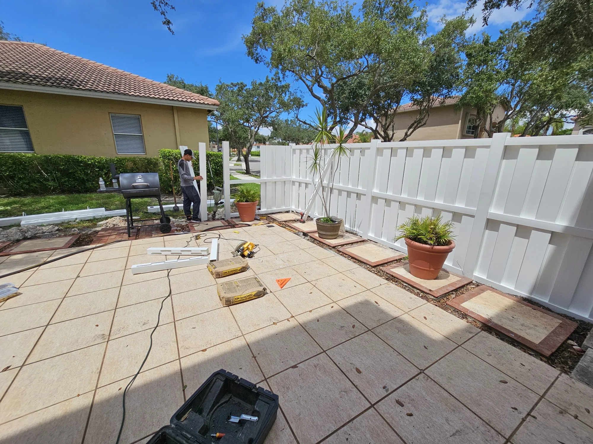 New privacy fence during final installation