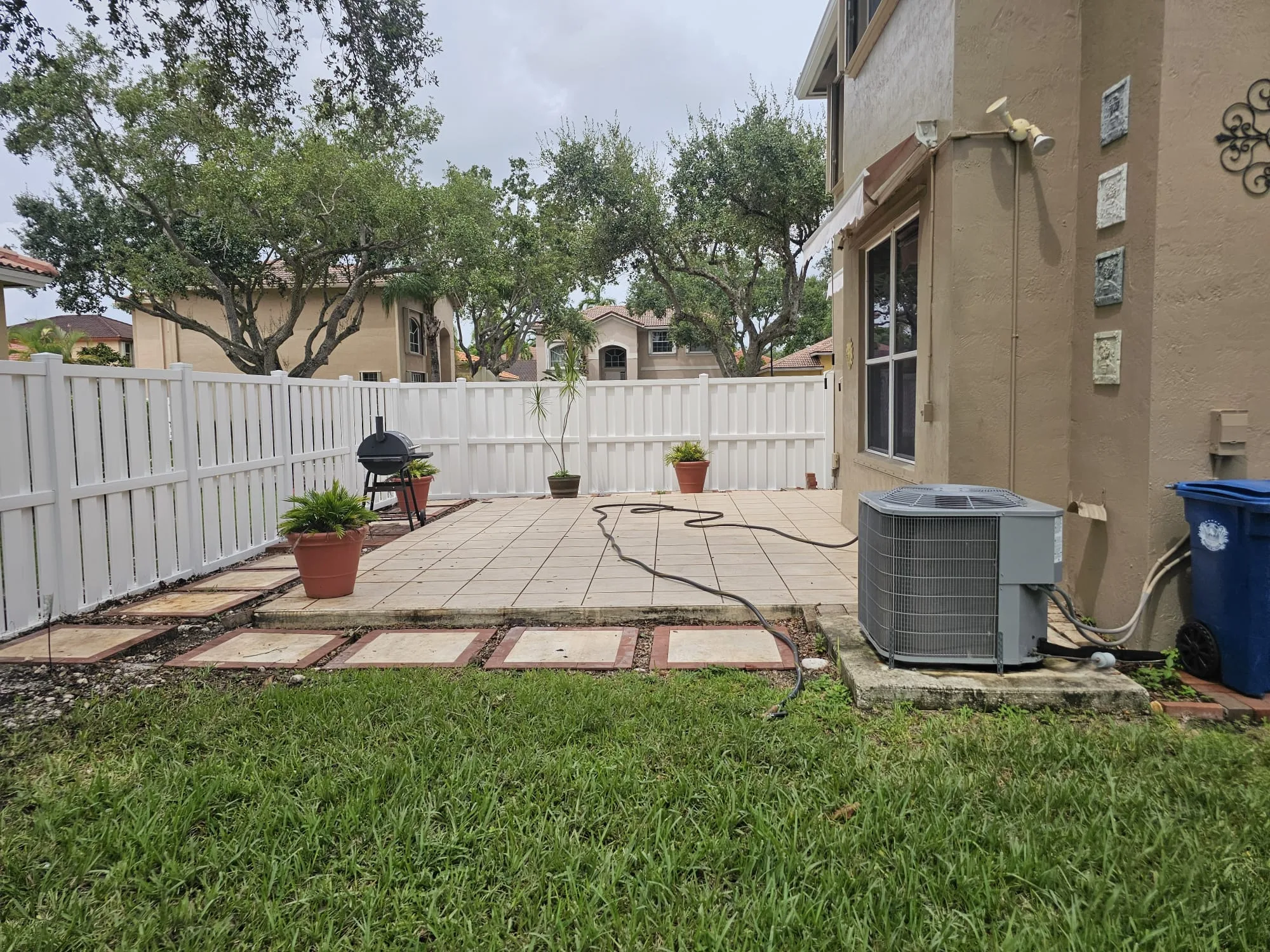 Completed white privacy fence detail