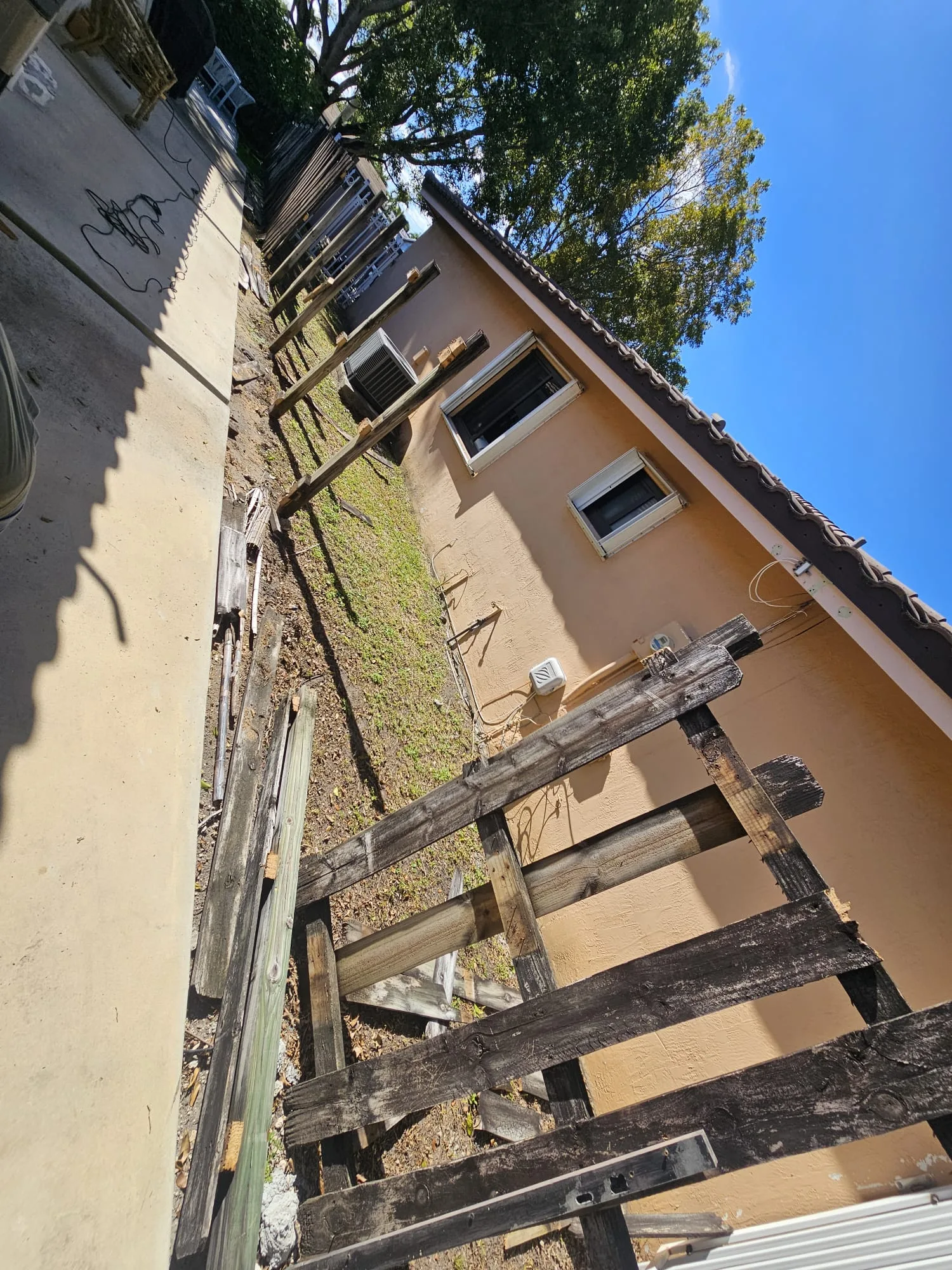 Existing wood fence before the rebuild