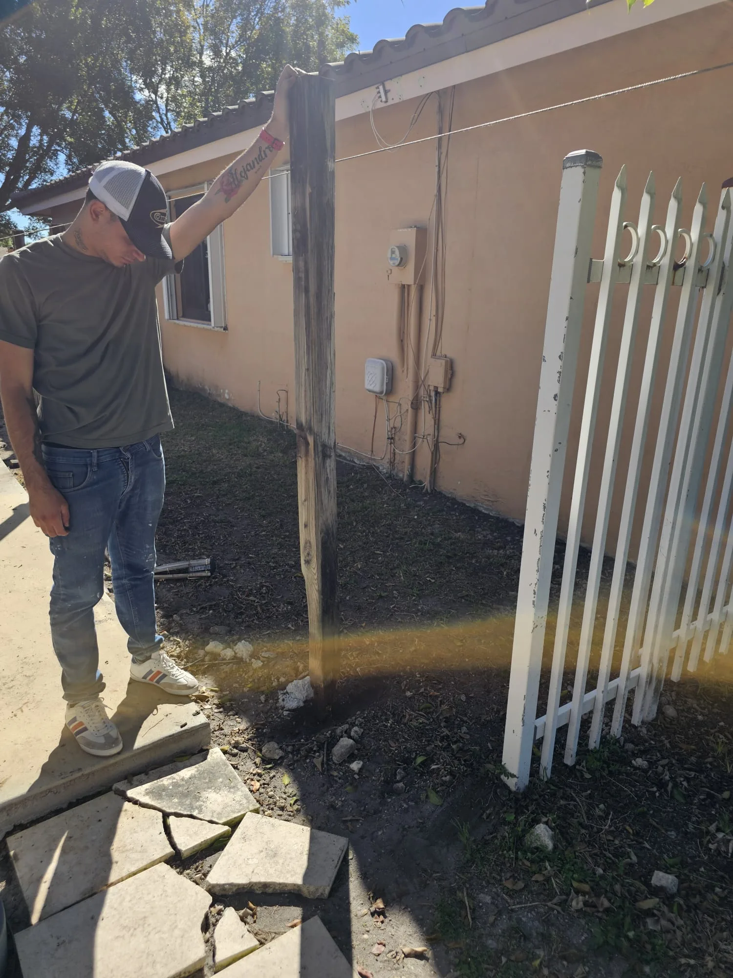 Crew beginning the wood fence replacement