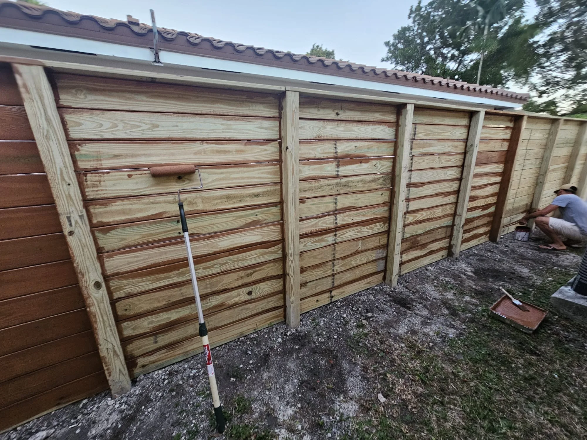 New wood fence nearing completion