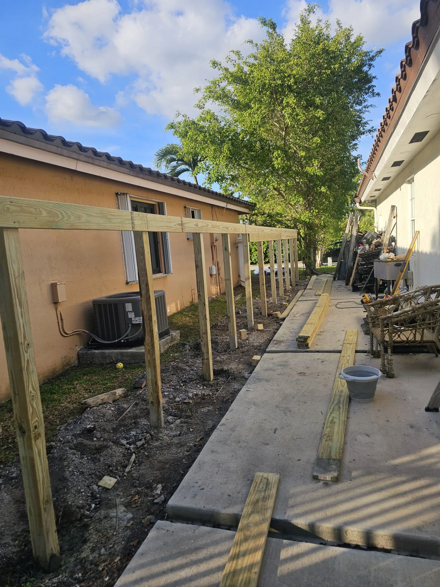 Fence posts prepared for a wood fence